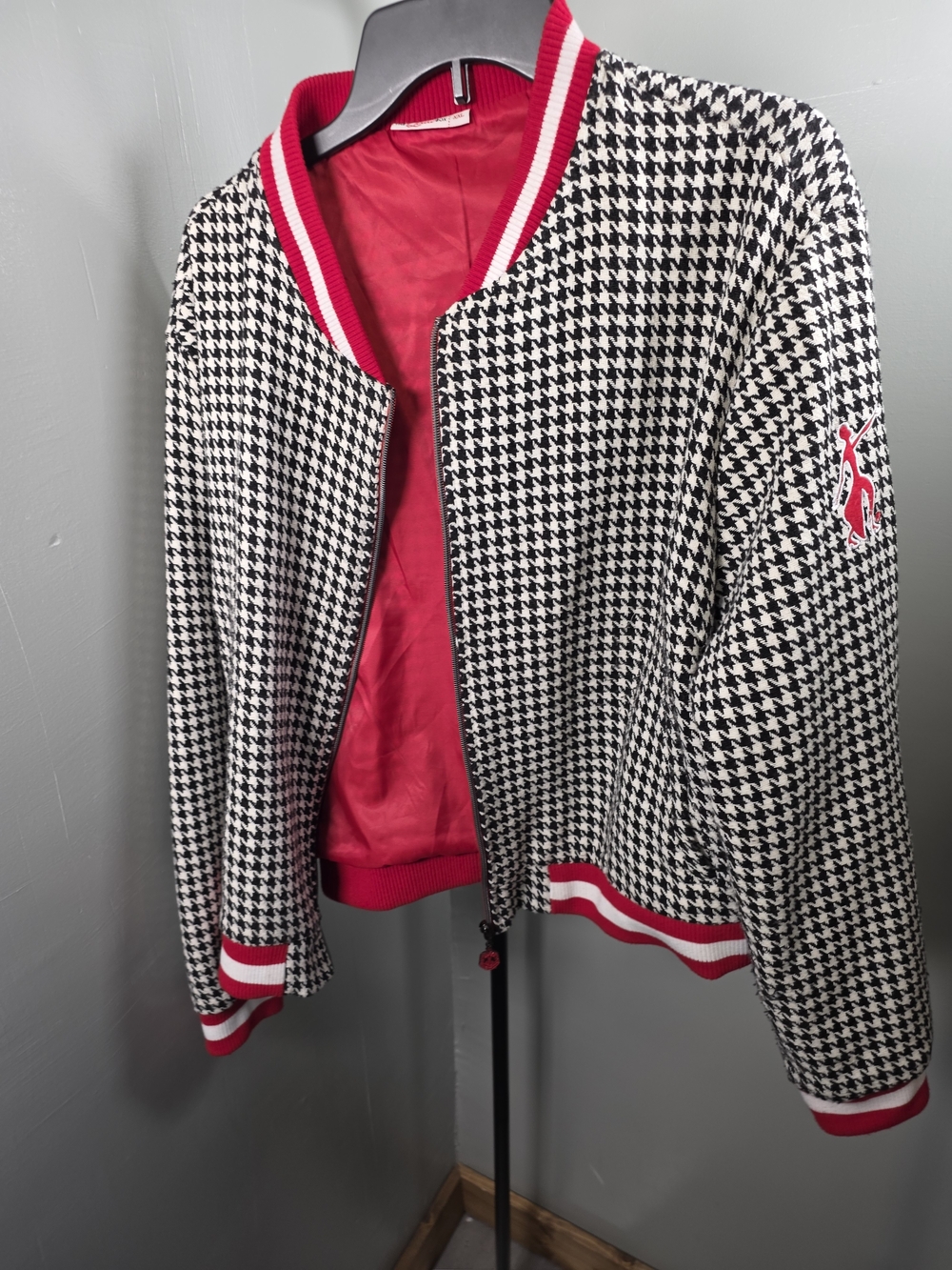 Delta Black-and-White Houndstooth Bomber Jacket with Red Trim